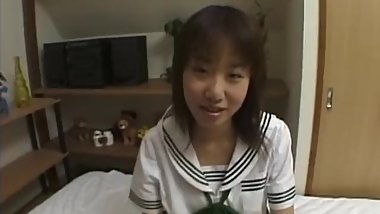 Asian teen playing dress-up