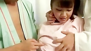 Nurse and doctor visiting patient