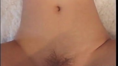 Lovely Japanese teen moans while being pounded from behind.