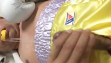 cum in wearing yellow boxing trunks with purple trim