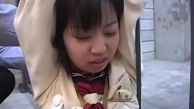 She is tied up to the prison cell and toy fucked