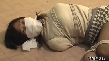 Secretary tied and over the nose gagged