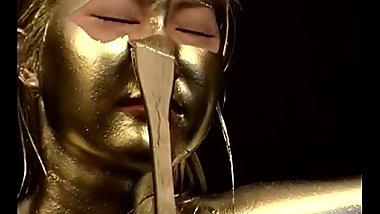 Girl got tied and painted in Gold
