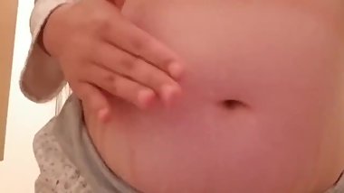 japanese girl stuffing belly