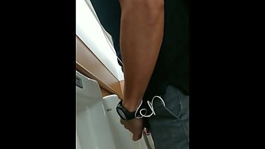 Handsome japanese guy pissing