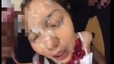 Asian cutie takes bukkake cum shower