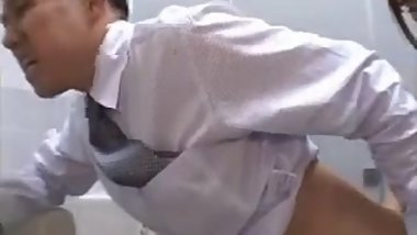 Asian Dominates with Strapon