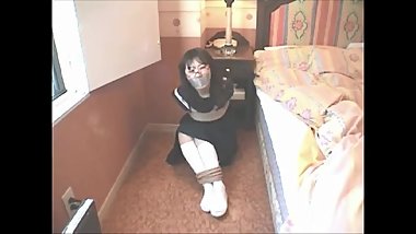 Japanese school girl tape gagged-2